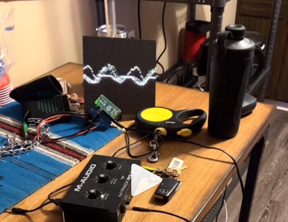 64x64 LED matrix demonstrates oscilloscope patterns from audio